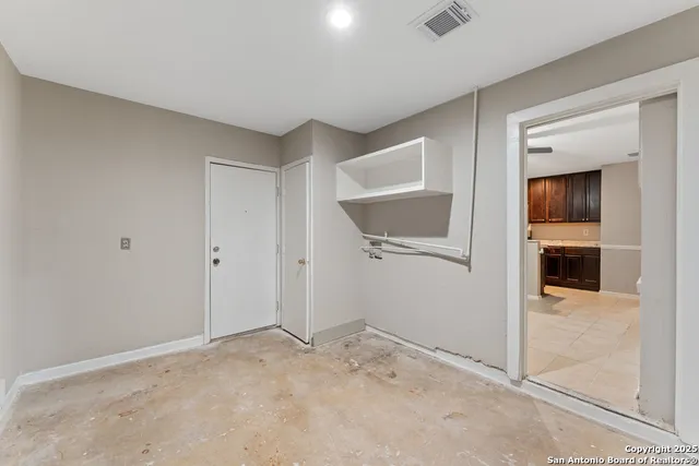 a view of livingroom with kitchen