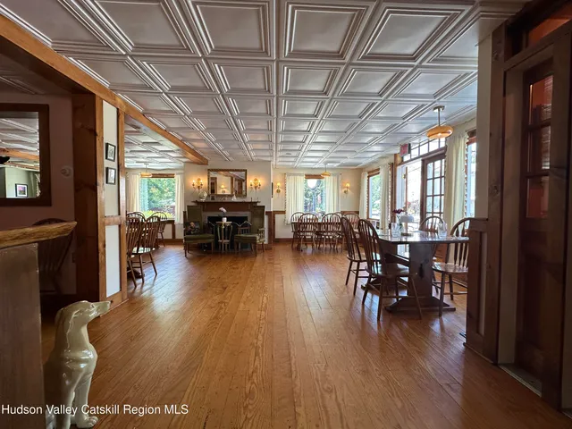 a view of a dining room with furniture