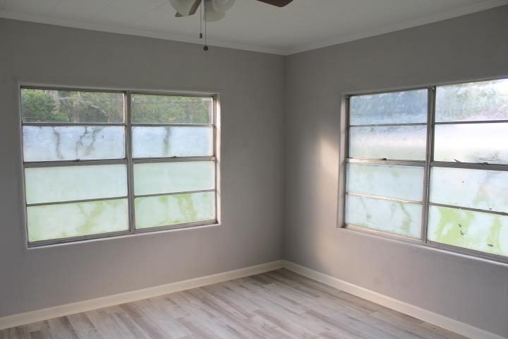 875 Woodrow Street Silsbee, TX 77656 - Photo 22 of 30 a view of an empty room with a window