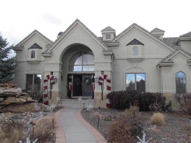 a view of a house with large windows