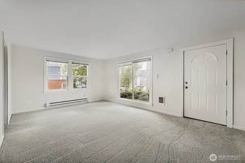an empty room with windows
