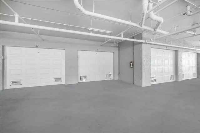 an aerial view of a city with lawn chairs