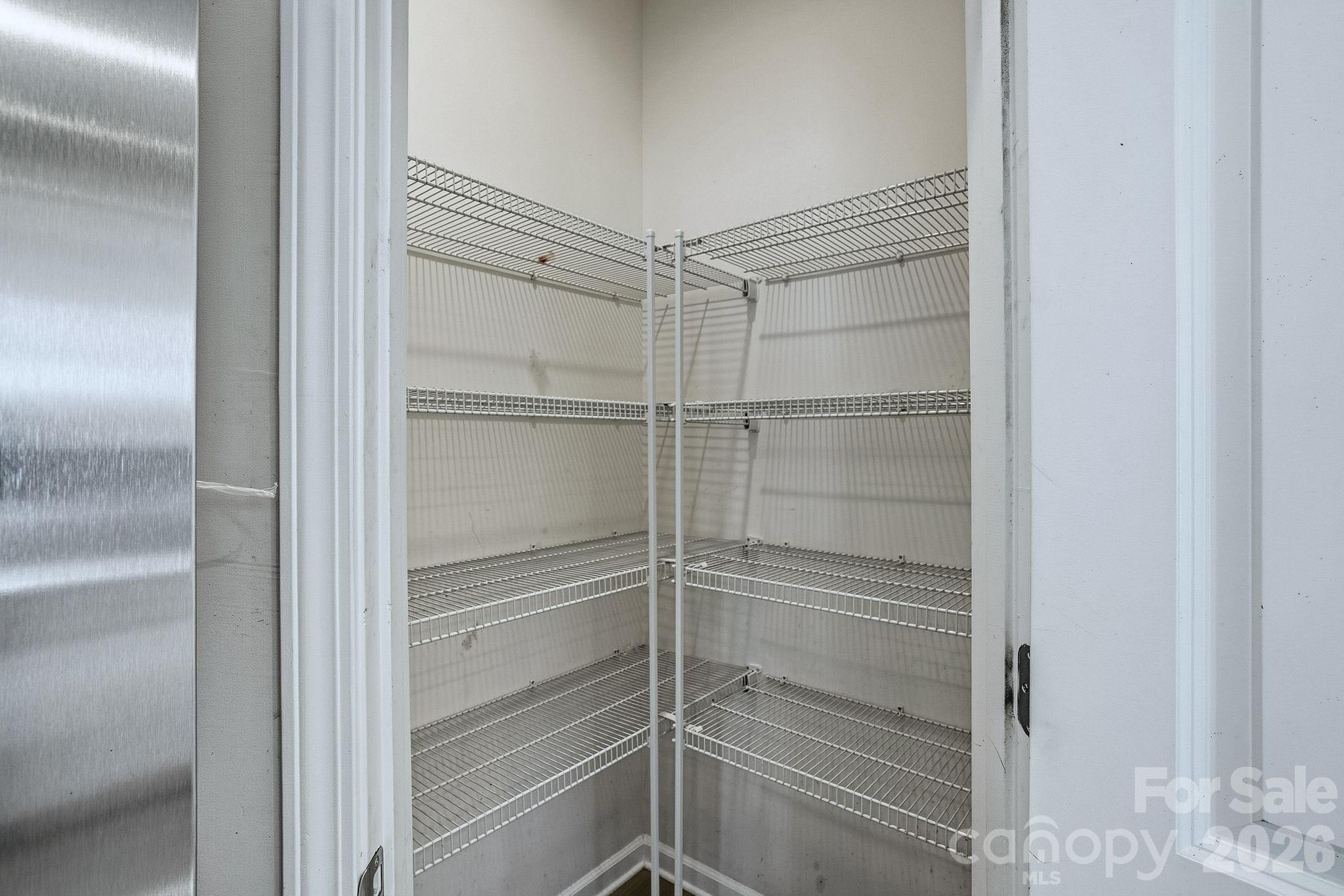124 Tackle Troutman, NC 28166 - Photo 21 of 44 a empty closet with white paint