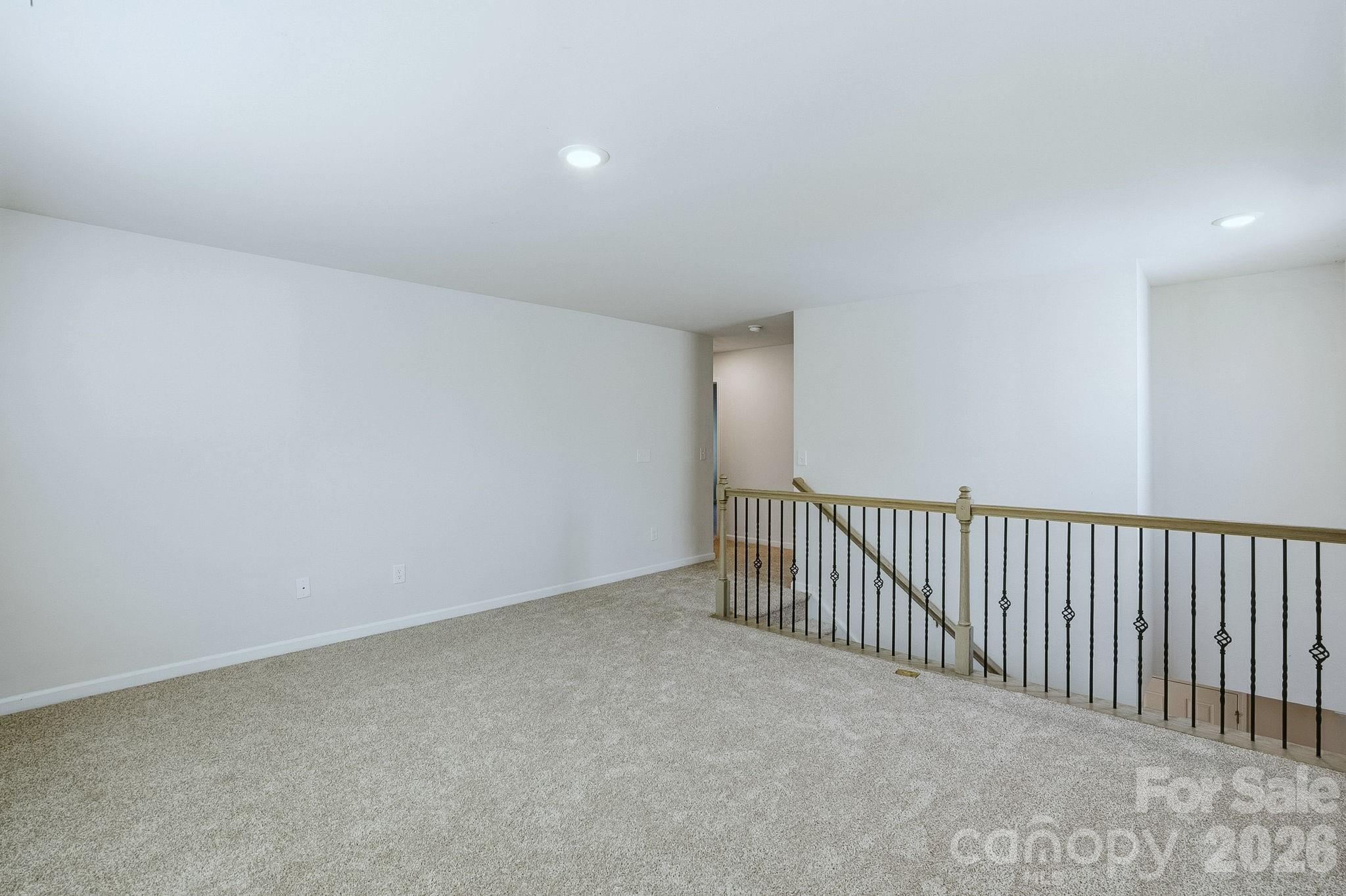 124 Tackle Troutman, NC 28166 - Photo 23 of 44 a view of an empty room