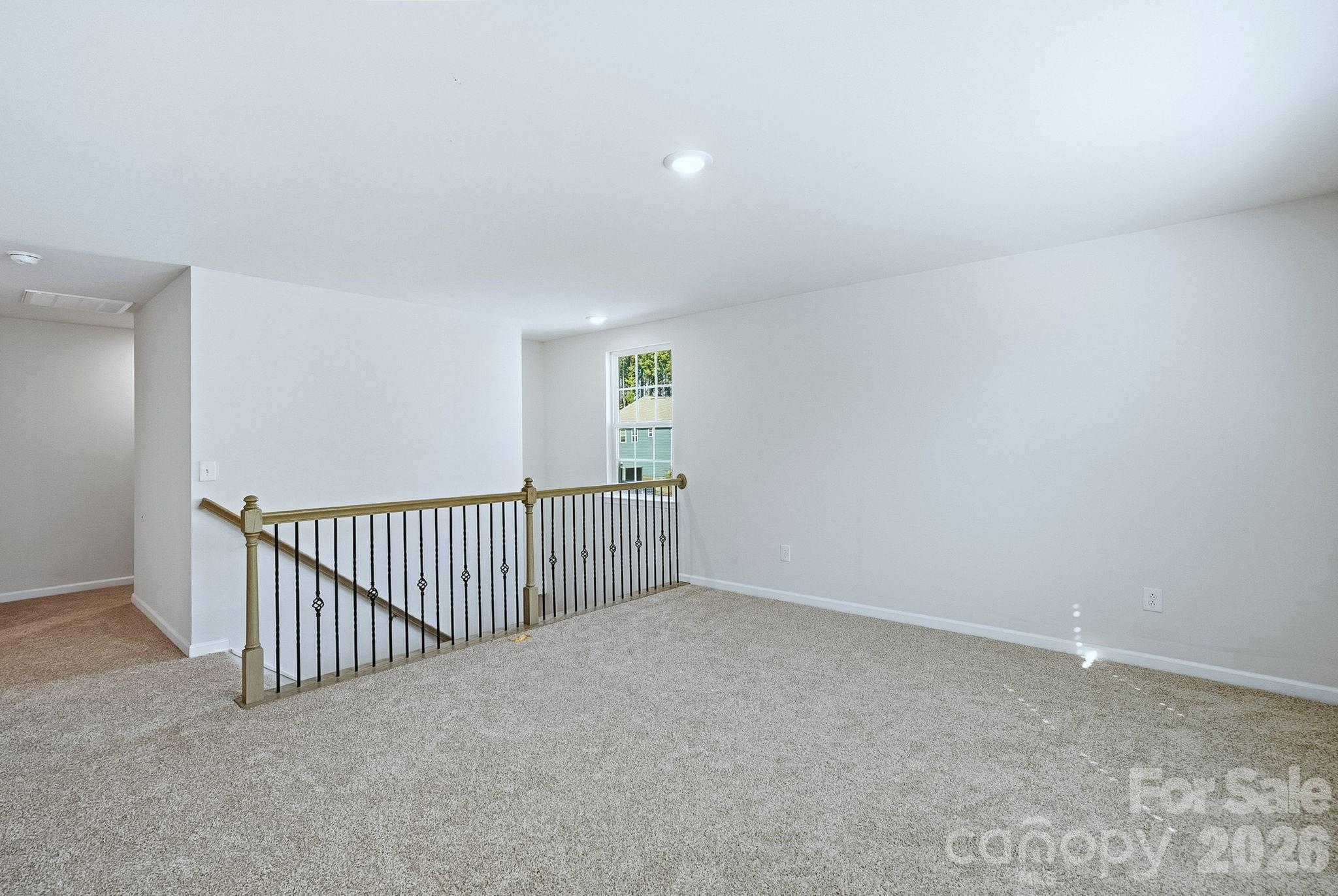 124 Tackle Troutman, NC 28166 - Photo 24 of 44 a view of a hallway