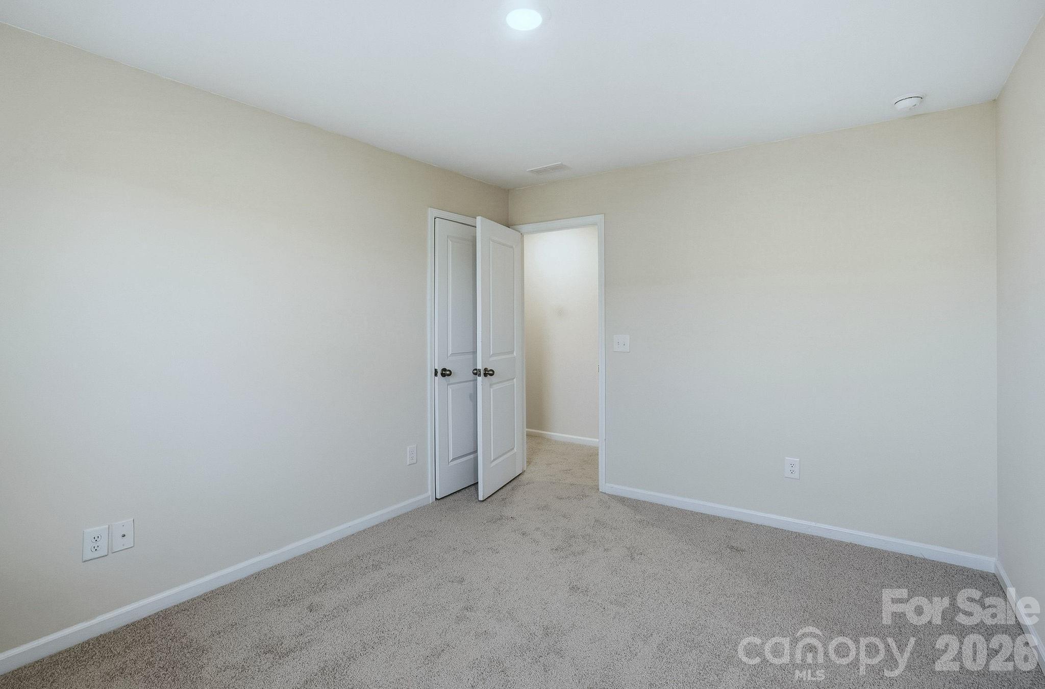 124 Tackle Troutman, NC 28166 - Photo 26 of 44 a view of an empty room