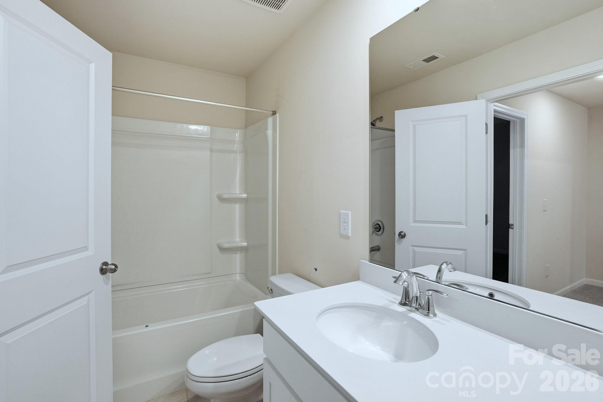 124 Tackle Troutman, NC 28166 - Photo 34 of 44 a bathroom with a sink toilet and shower