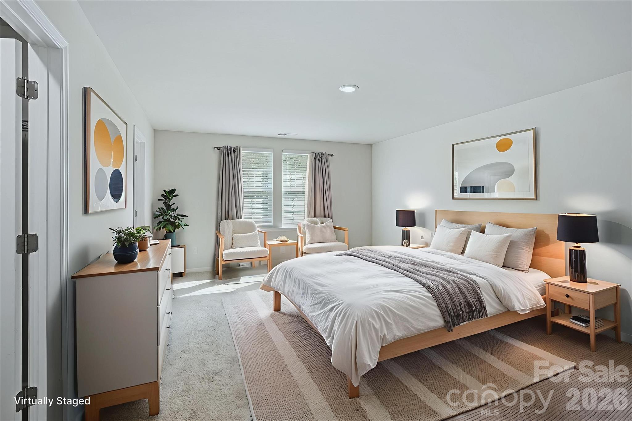 124 Tackle Troutman, NC 28166 - Photo 7 of 44 a spacious bedroom with a bed and a large mirror