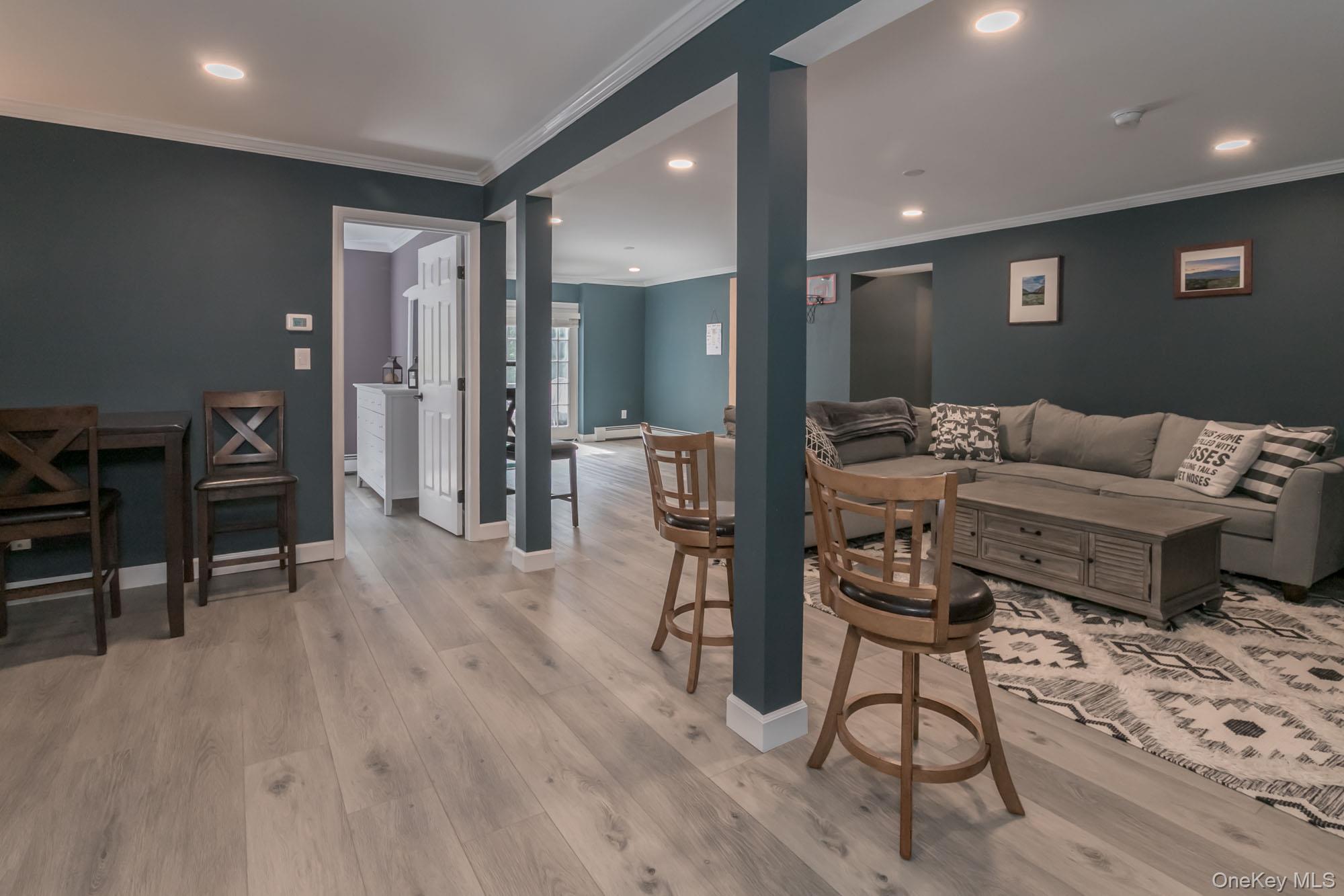 102 Beverly Road Chester, NY 10918 - Photo 38 of 49 a living room with furniture and a wooden floor