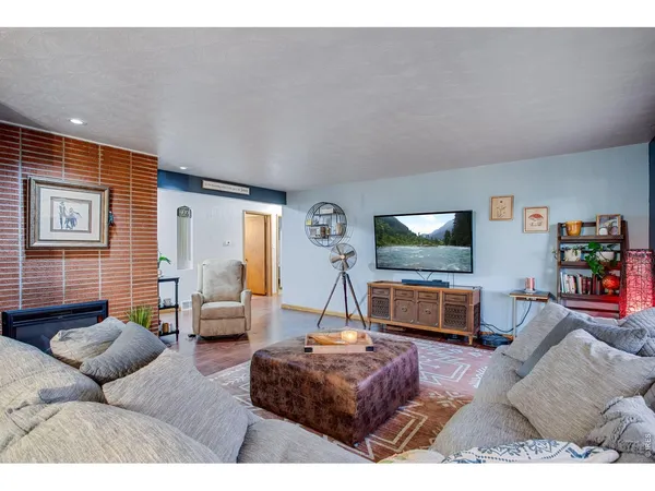 a view of livingroom with furniture and wooden floor