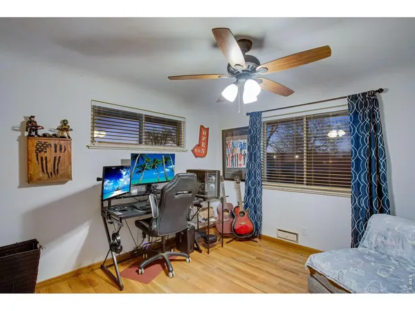 a workspace with furniture and a window