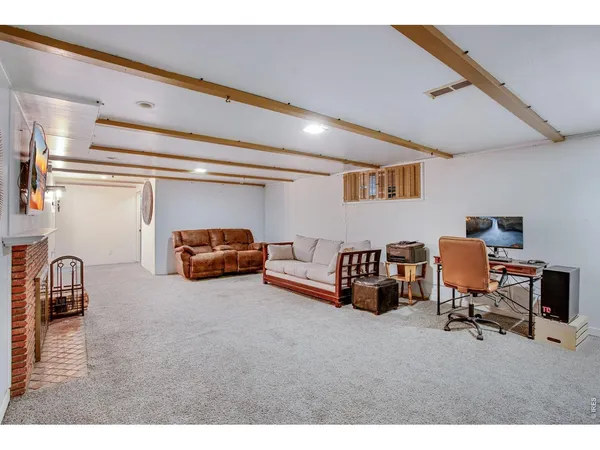 a living room with furniture and a couch