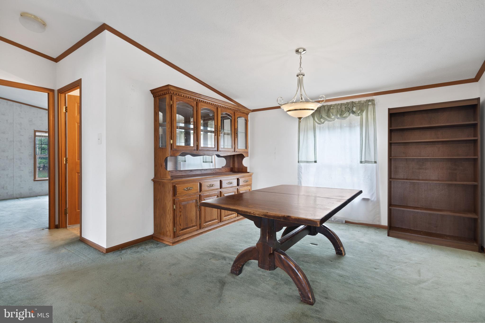 305 Bedington Road Martinsburg, WV 25404 - Photo 12 of 35 a room with furniture a window and a walk in closet