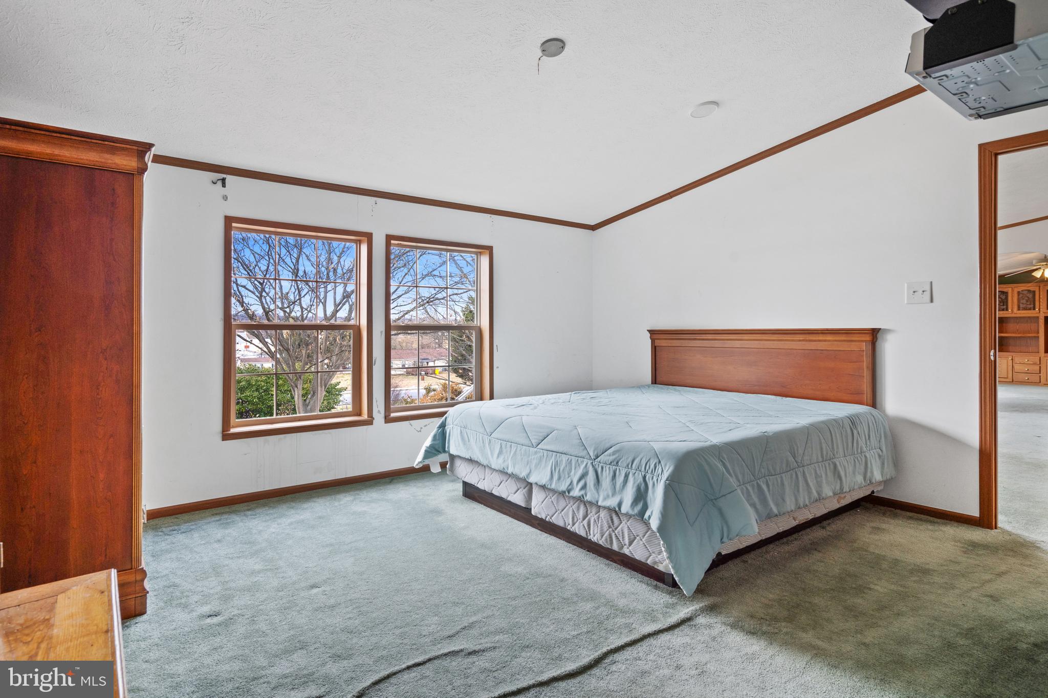 305 Bedington Road Martinsburg, WV 25404 - Photo 15 of 35 a bedroom with a large bed and a window