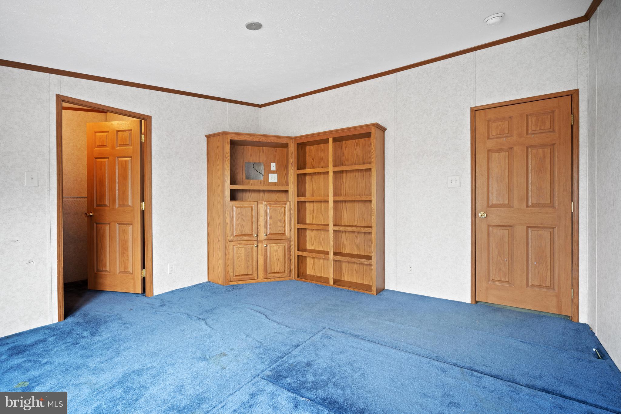 305 Bedington Road Martinsburg, WV 25404 - Photo 17 of 35 a view of an empty room with wooden floor and closet