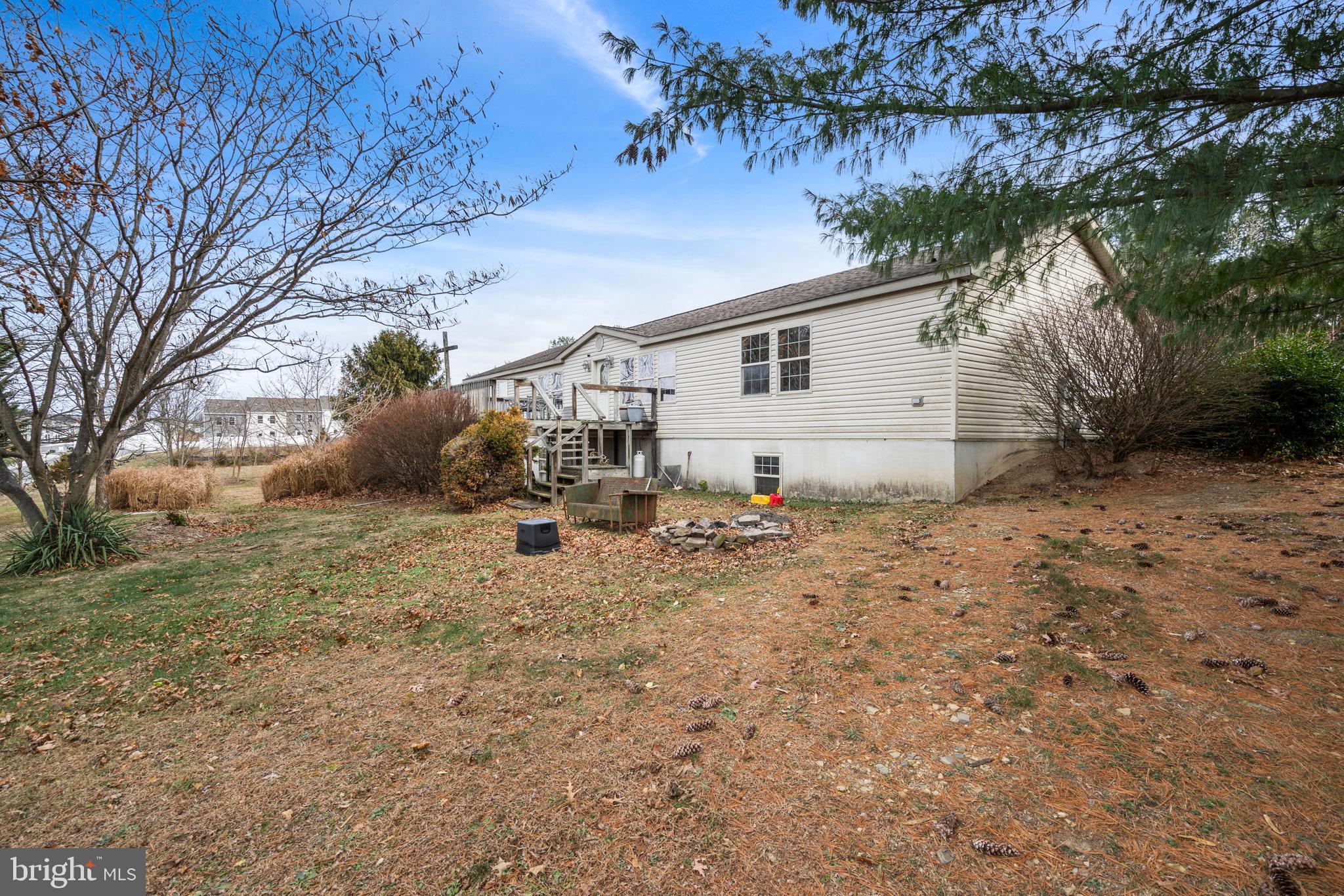 305 Bedington Road Martinsburg, WV 25404 - Photo 25 of 35 a view of a house with a yard
