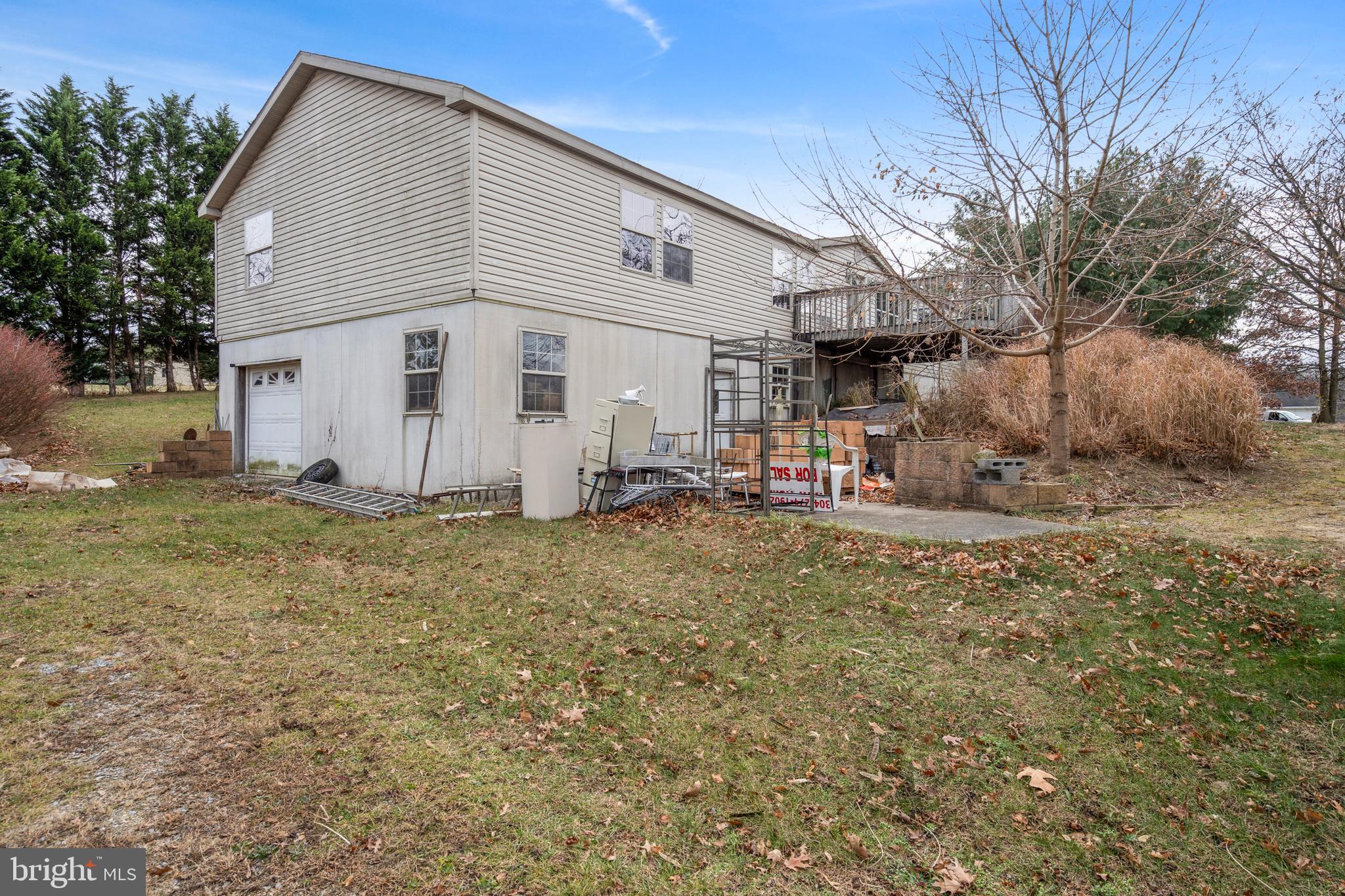 305 Bedington Road Martinsburg, WV 25404 - Photo 26 of 35 a view of a white house with a yard