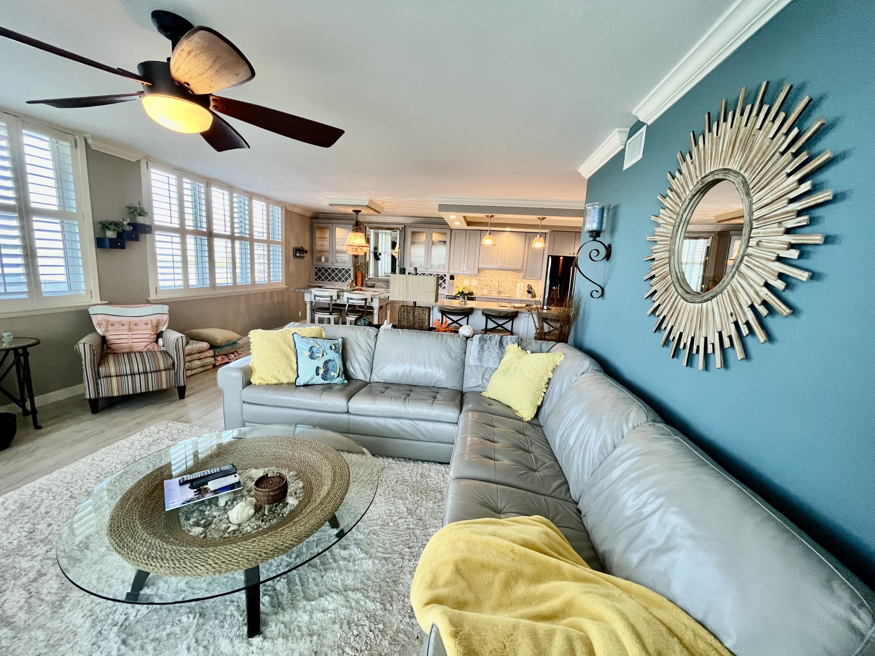 5440 North Ocean Drive, Unit 601 Riviera Beach, FL 33404 - Photo 19 of 55 a living room with furniture and a rug
