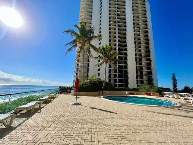 a view of street with tall buildings