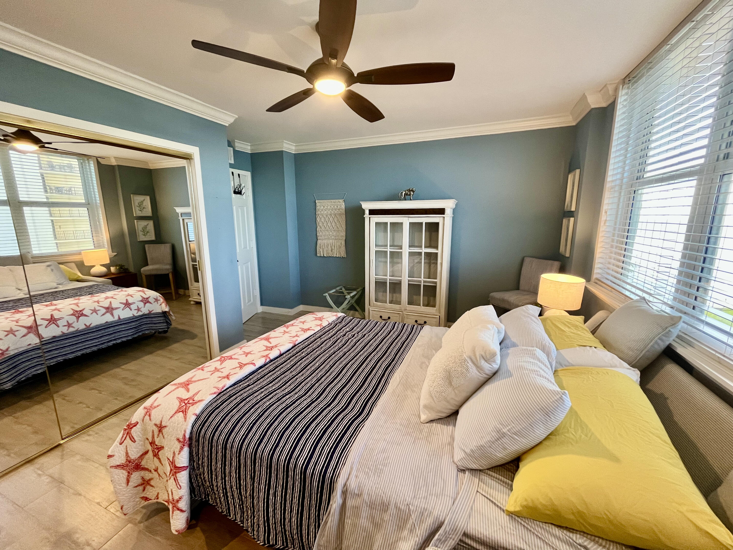 5440 North Ocean Drive, Unit 601 Riviera Beach, FL 33404 - Photo 25 of 55 a bedroom with two beds and a large window