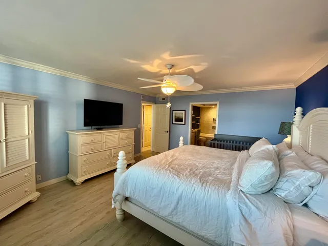 a bathroom with a tub and a shower