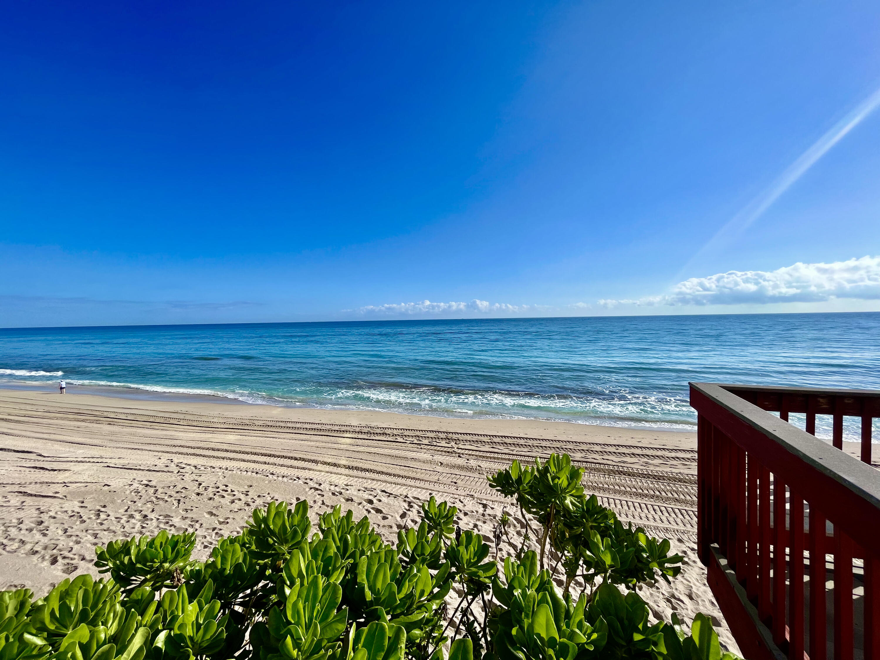 5440 North Ocean Drive, Unit 601 Riviera Beach, FL 33404 - Photo 3 of 55 a view of a lake with a house in the background