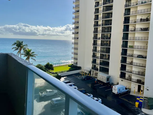 a front view of a building with outdoor space