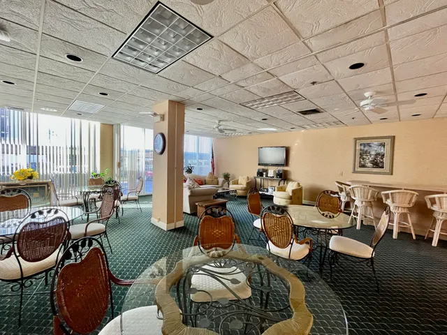 a room with gym equipment and a large window