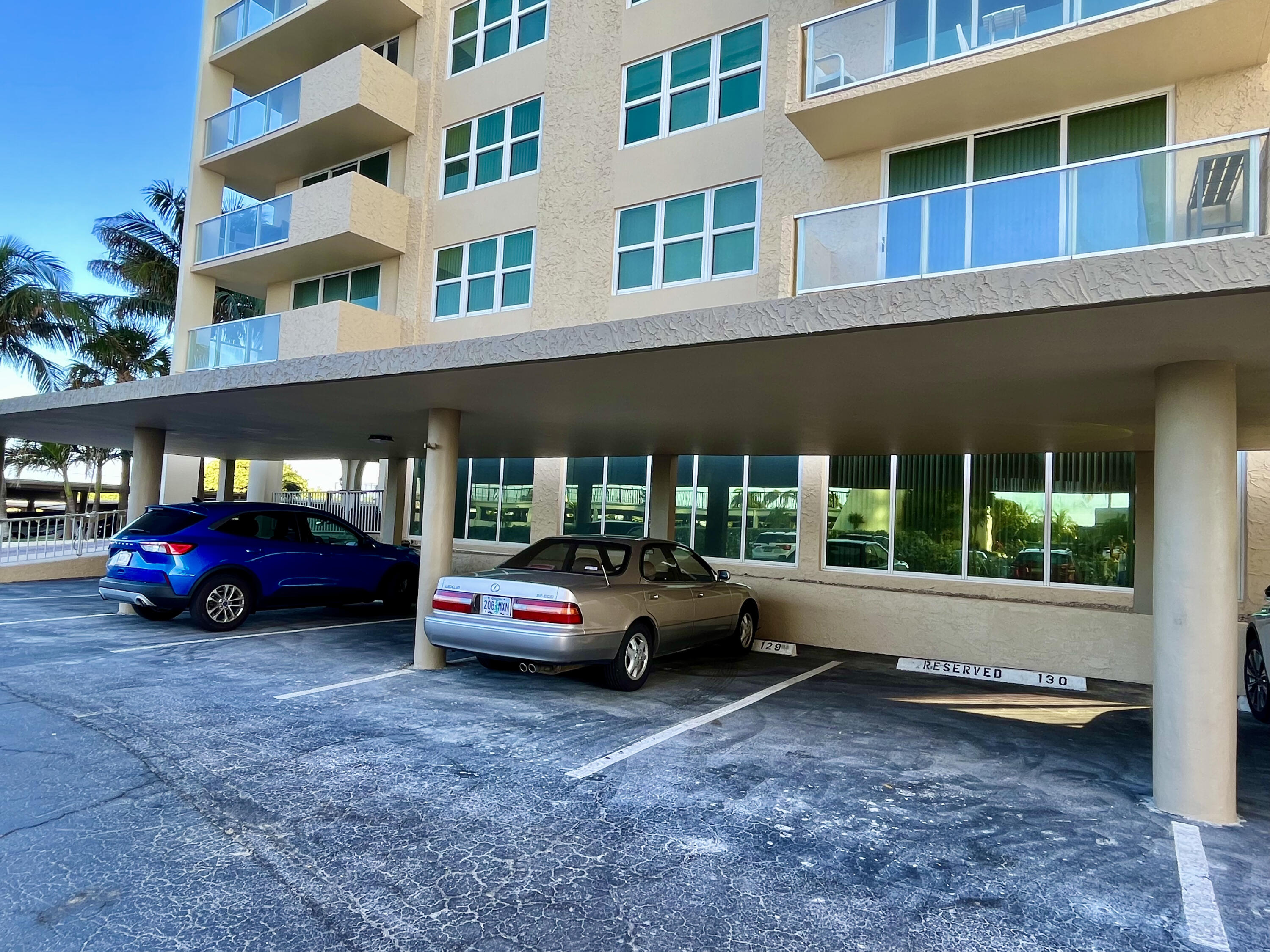 5440 North Ocean Drive, Unit 601 Riviera Beach, FL 33404 - Photo 53 of 55 a car parked in front of a building