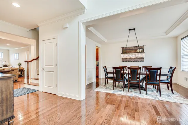 a kitchen with stainless steel appliances a sink stove and refrigerator