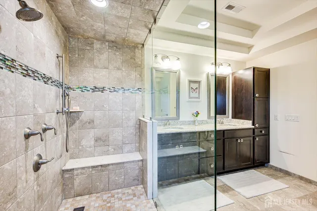 a view of kitchen with furniture and a flat screen tv