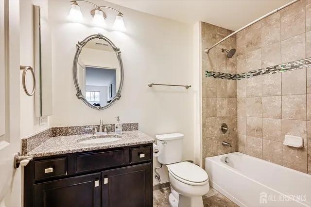 a kitchen with a table and chairs in it