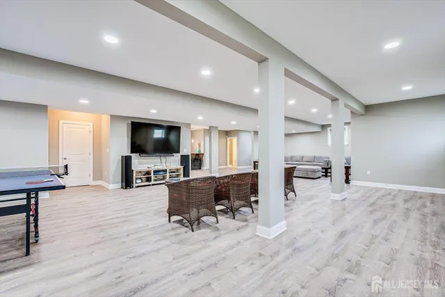 a view of yard with swimming pool and green space