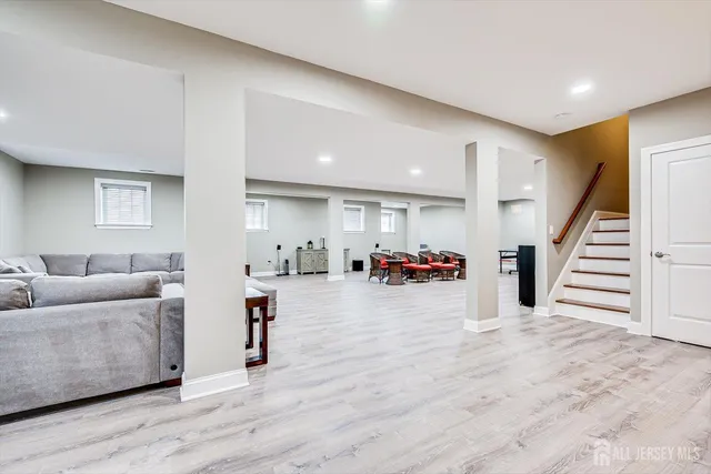 an aerial view of a house with a swimming pool