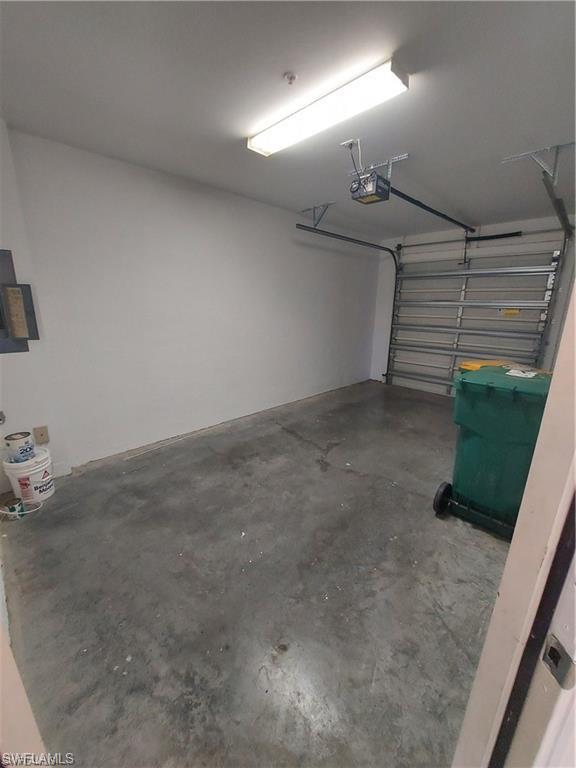 3268 Amanda Lane, Unit 3 Naples, FL 34109 - Photo 14 of 26 a view of a garage