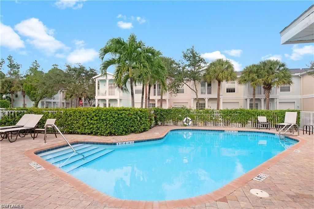 3268 Amanda Lane, Unit 3 Naples, FL 34109 - Photo 4 of 26 a view of a swimming pool with a patio