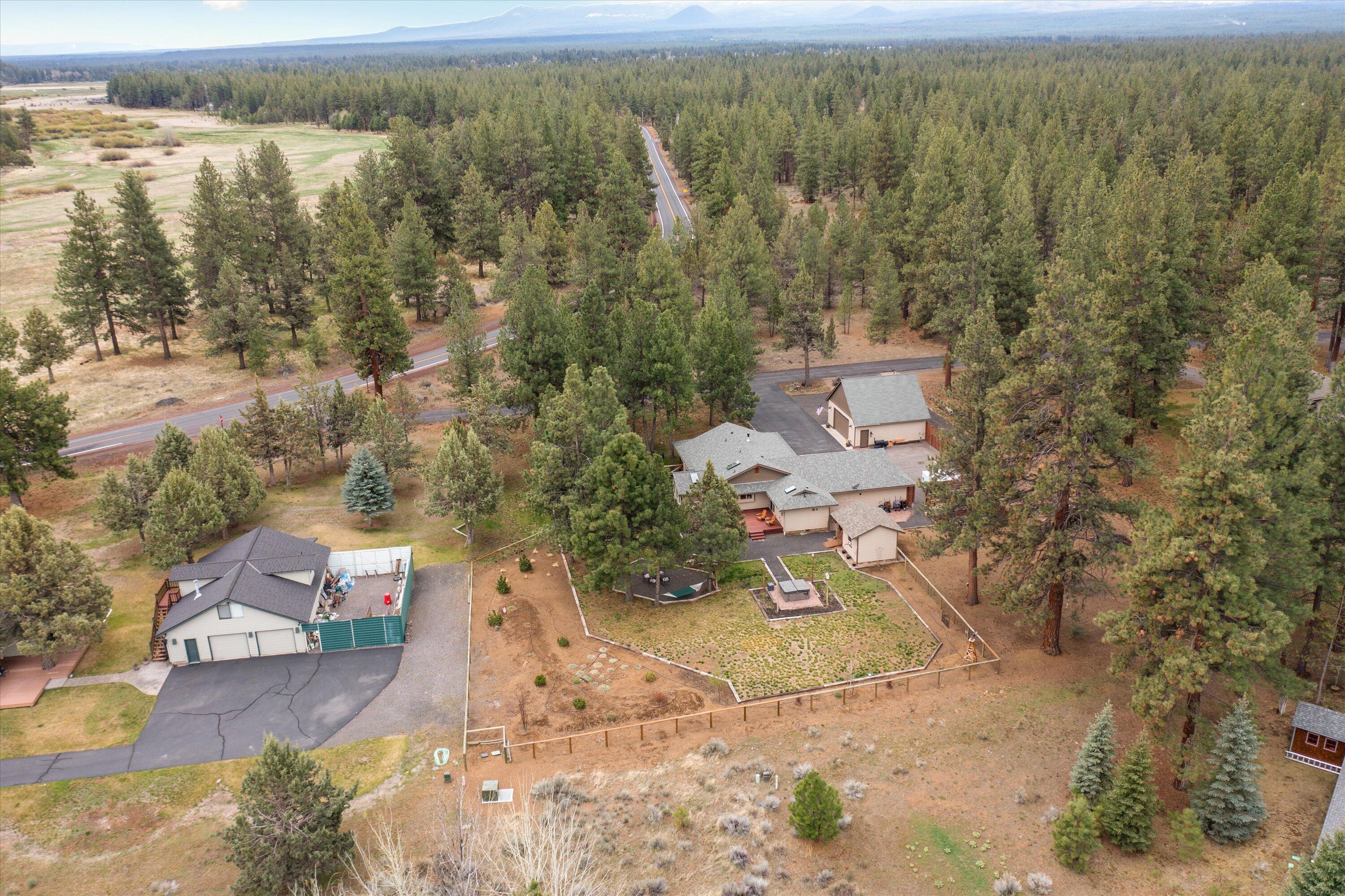 15868 Lundy Road Sisters, OR 97759 - Photo 53 of 53 an aerial view of a house with a yard