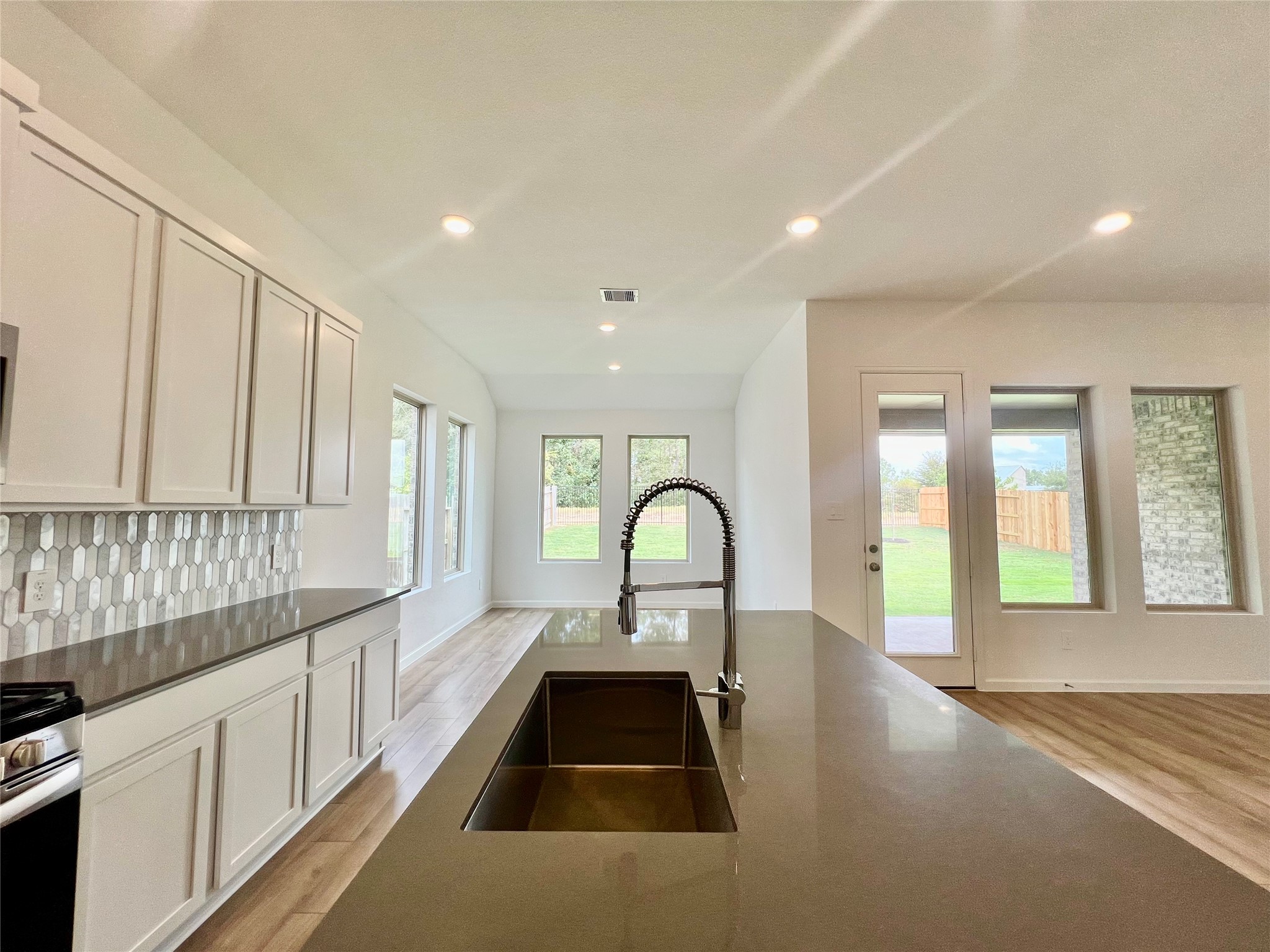 17771 Misty Brk Lane Conroe, TX 77302 - Photo 16 of 48 a view of a kitchen with a large window