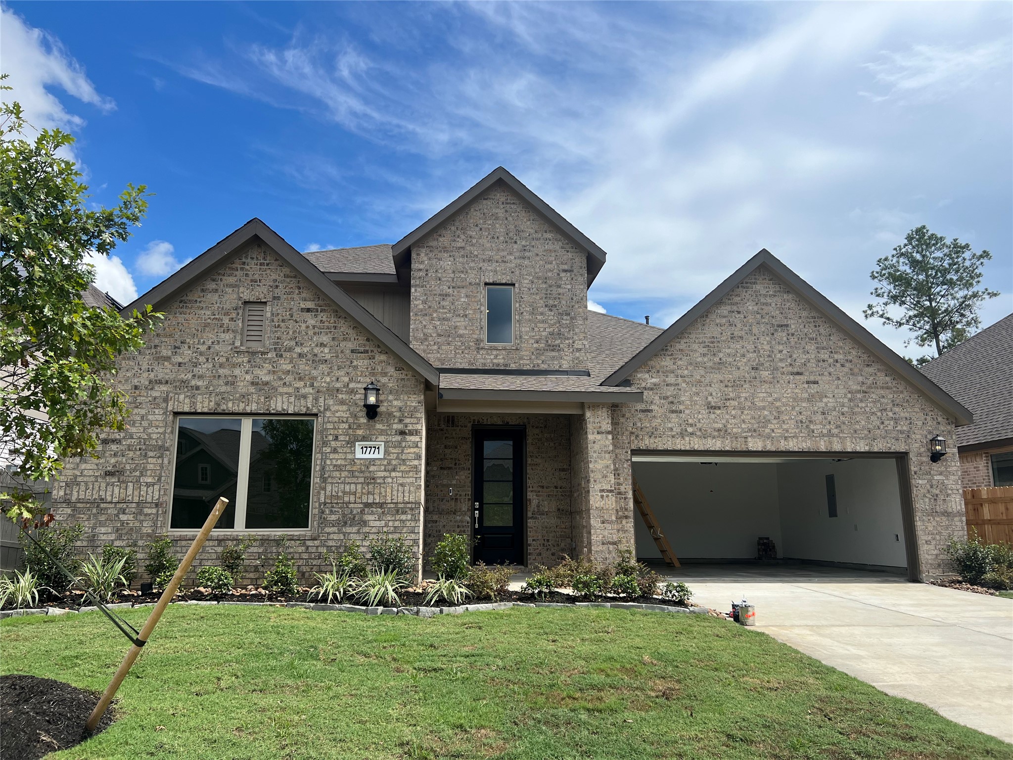 17771 Misty Brk Lane Conroe, TX 77302 - Photo 2 of 48 a front view of house with yard and green space