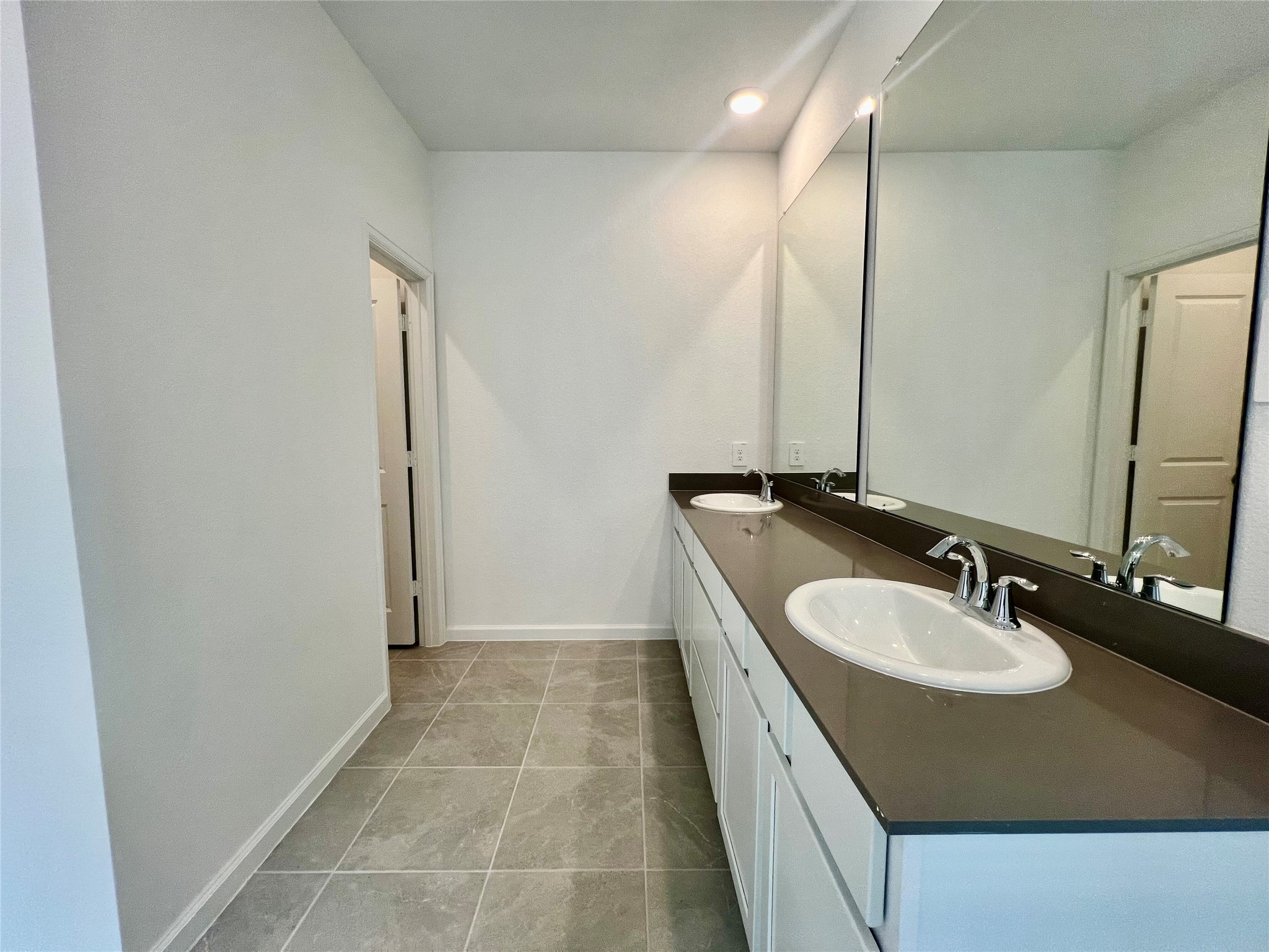 17771 Misty Brk Lane Conroe, TX 77302 - Photo 23 of 48 a bathroom with a sink and a mirror