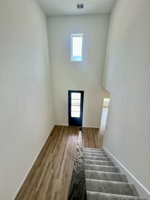 17771 Misty Brk Lane Conroe, TX 77302 - Photo 27 of 48 a view of a hallway view with wooden floor and staircase