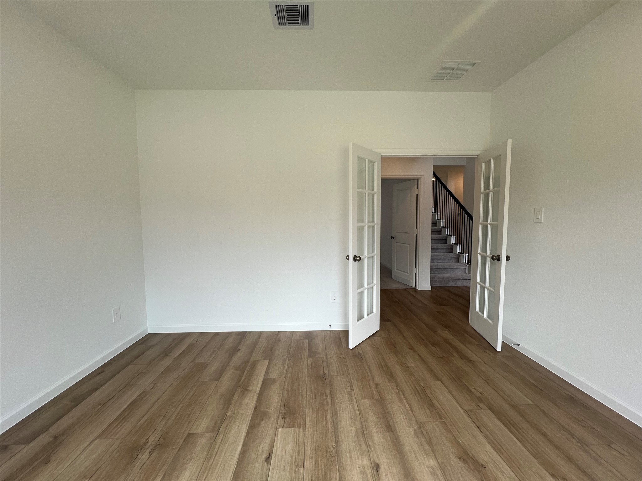 17771 Misty Brk Lane Conroe, TX 77302 - Photo 8 of 48 a view of a room with wooden floor