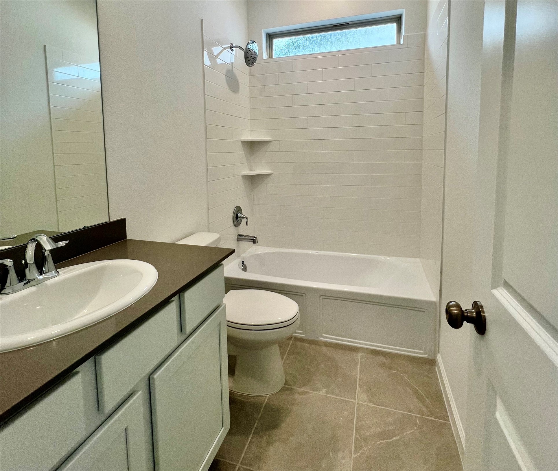 17771 Misty Brk Lane Conroe, TX 77302 - Photo 9 of 48 a bathroom with a granite countertop sink toilet and shower