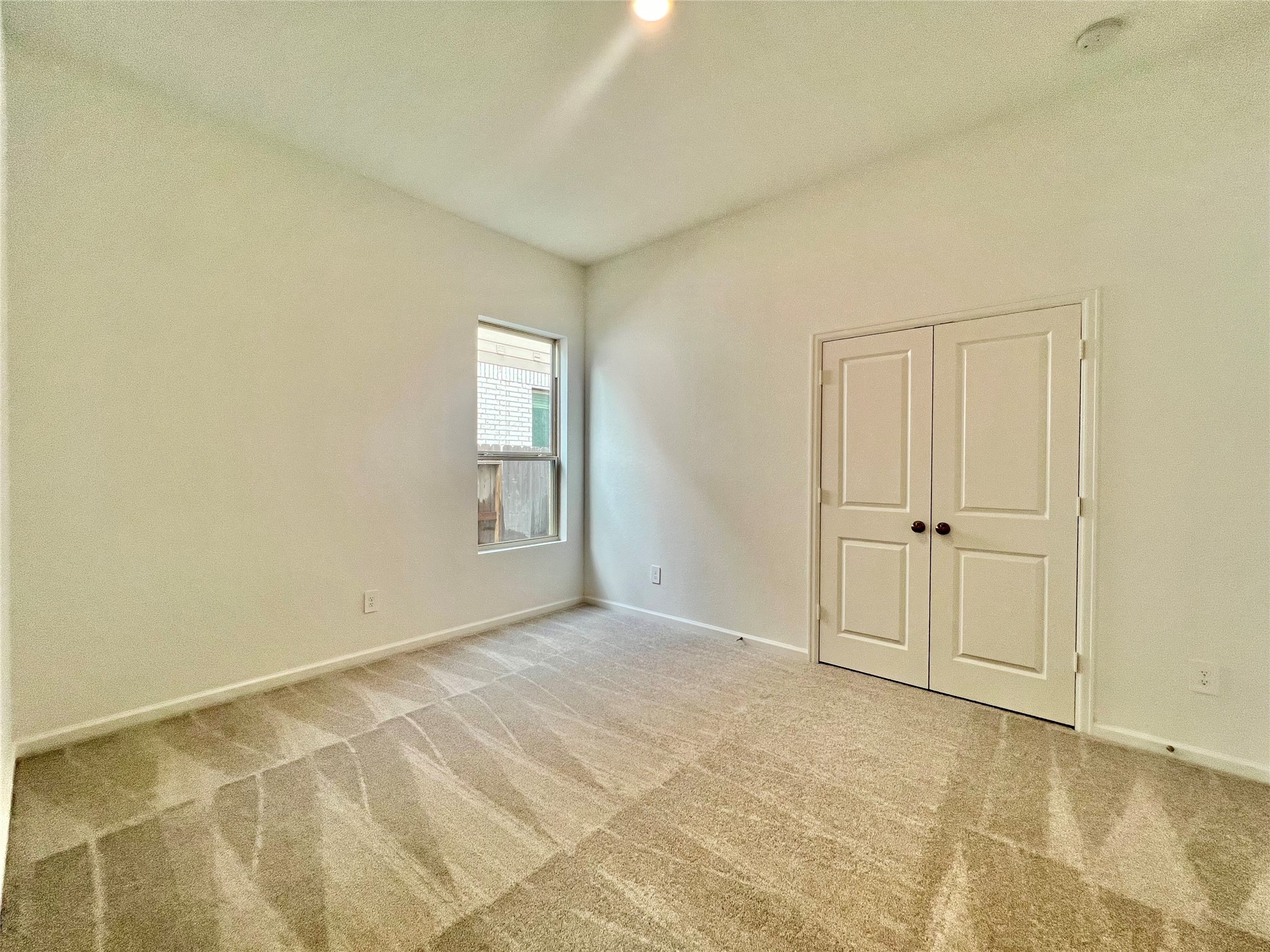 17771 Misty Brk Lane Conroe, TX 77302 - Photo 10 of 48 a view of an empty room and window