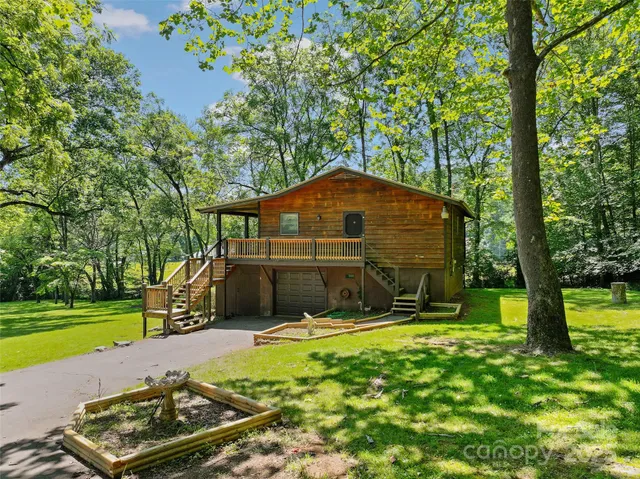 a view of a backyard with a garden