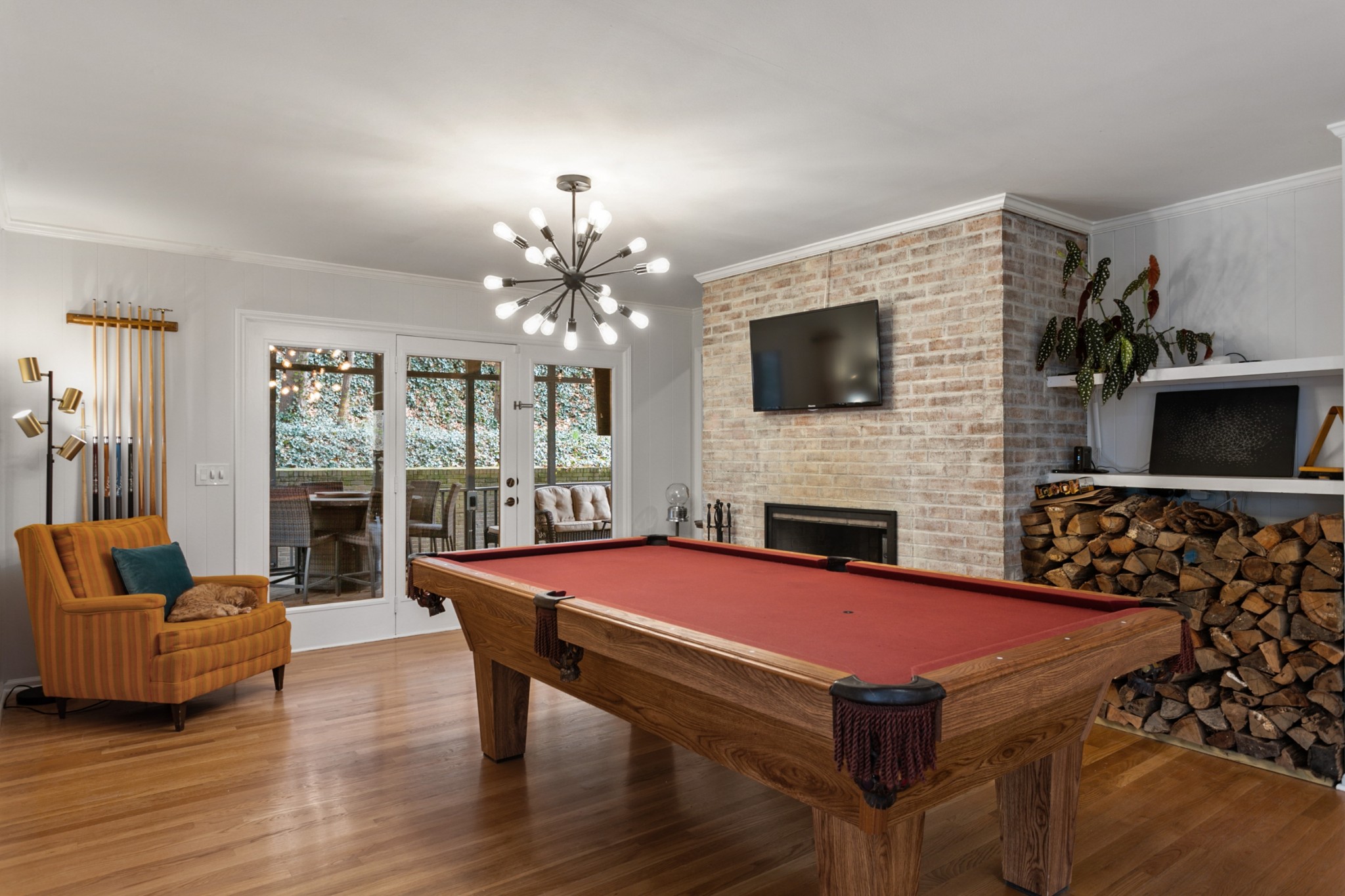 754 High Point Ridge Road Franklin, TN 37069 - Photo 19 of 53 a living room with furniture a flat screen tv and a fireplace