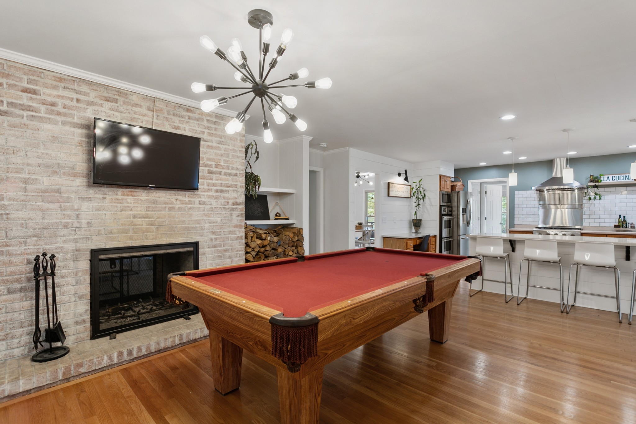 754 High Point Ridge Road Franklin, TN 37069 - Photo 20 of 53 a view of a livingroom with furniture and a flat screen tv