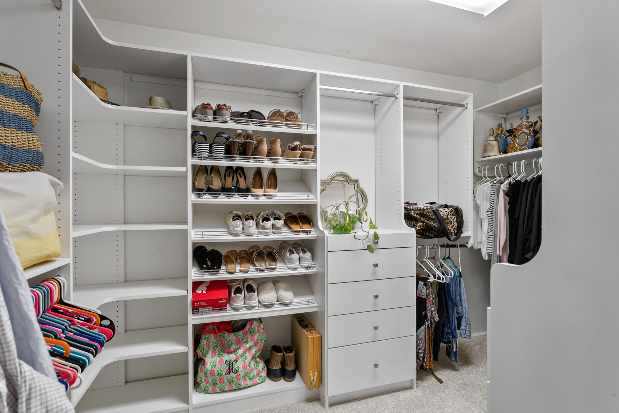 754 High Point Ridge Road Franklin, TN 37069 - Photo 24 of 53 a view of walk in closet with clothes and shoes