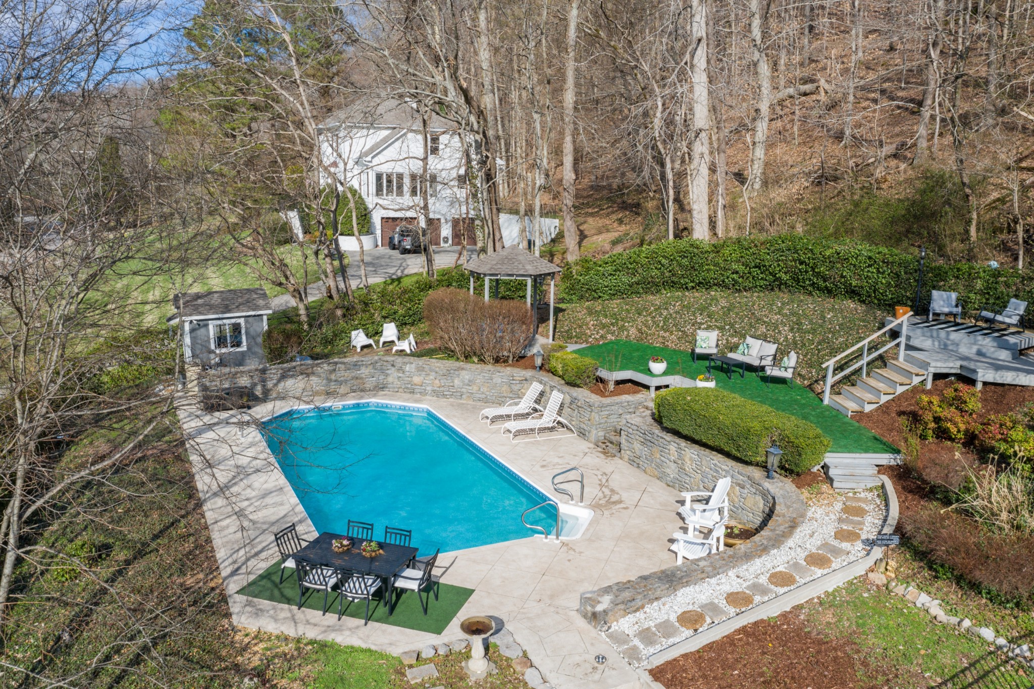 754 High Point Ridge Road Franklin, TN 37069 - Photo 49 of 53 a view of a chairs and table in backyard