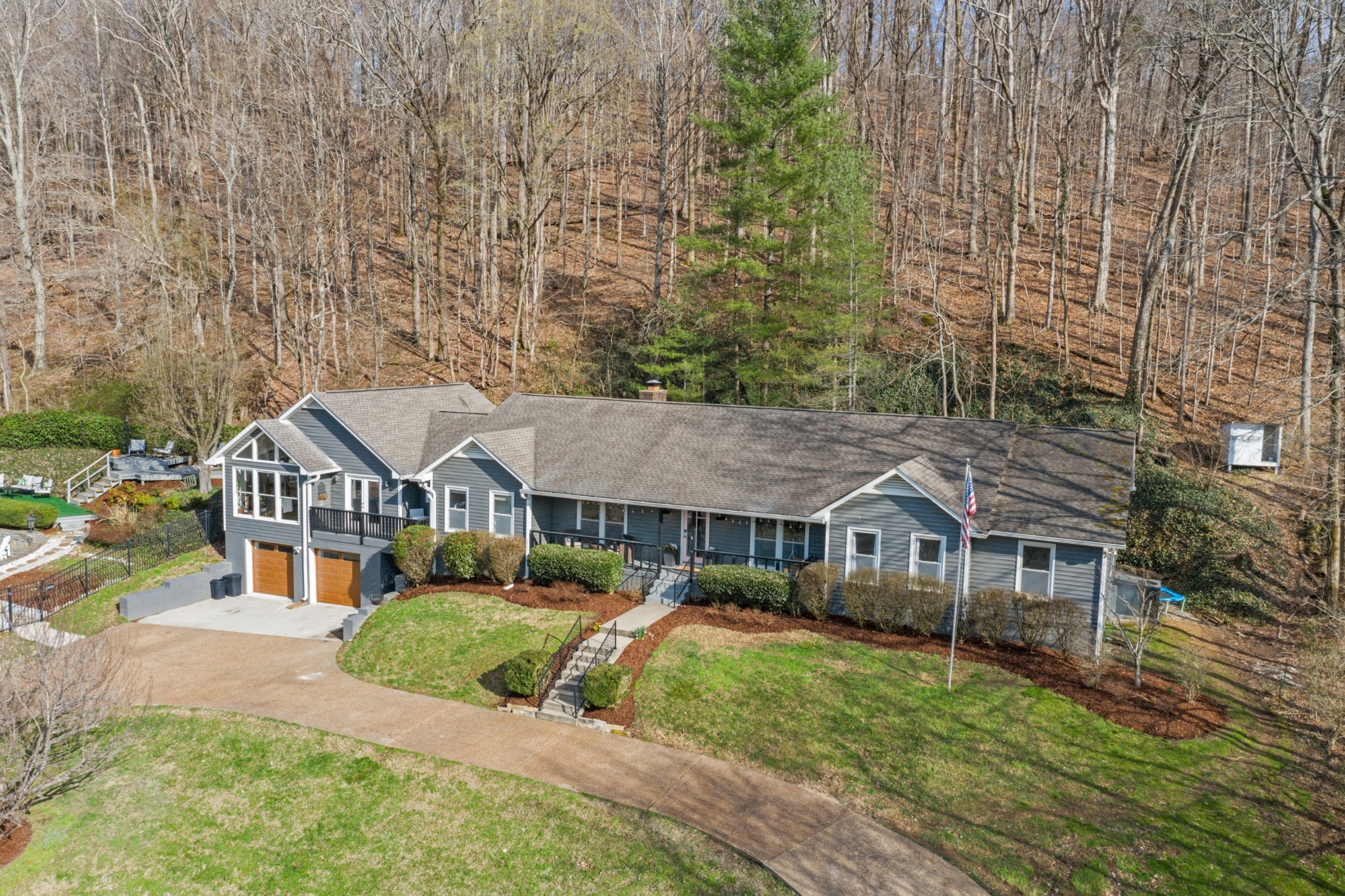 754 High Point Ridge Road Franklin, TN 37069 - Photo 50 of 53 a front view of a house with garden